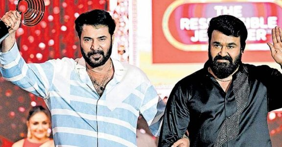 Mohanlal and mammooty while receiving awards